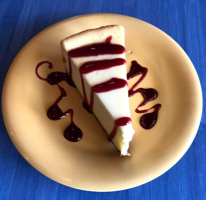 NY Style Cheesecake with Raspberry Topping · 