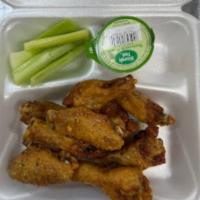 Wings Only · Served with blue cheese or ranch and celery.
