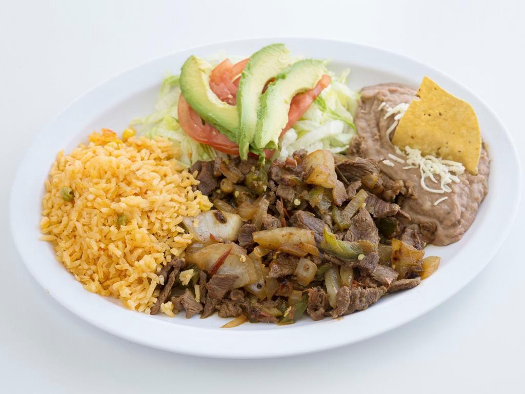 Bistec a la Mexicana Platillo · Servidos con arroz, frijoles y ensalada. Served with rice, beans and salad.
