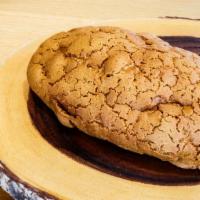 Mocha Bread · Subtle coffee-flavored bread baked with crispy mocha biscuit topping on top. Contains: wheat...