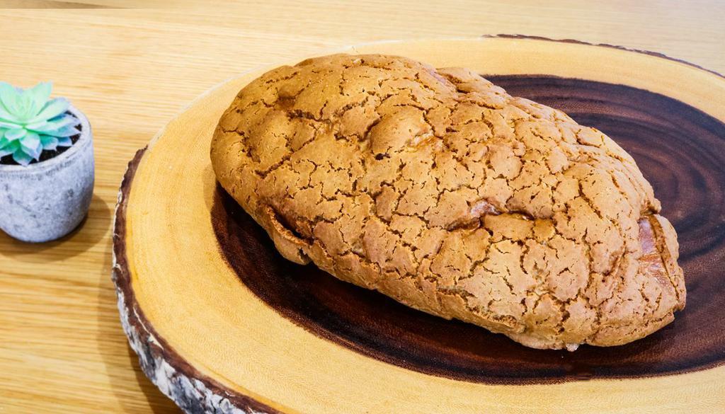 Mocha Bread · Subtle coffee-flavored bread baked with crispy mocha biscuit topping on top. Contains: wheat, egg, milk, and soy.