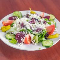 Greek Salad Lunch  · Mixed greens, tomato, cucumber, feta cheese pepperoncini, onion, beets and Greek olives.