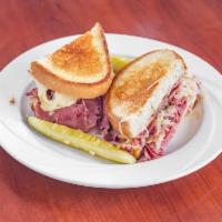 Corned Beef Sandwich Lunch  · 1/2 lb. corned beef. Served on grilled rye bread with Swiss Cheese.