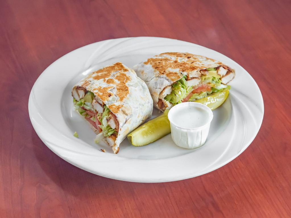 Greek Chicken Wrap Lunch  · Served with lettuce, tomato, feta cheese, onion and Greek dressing.
