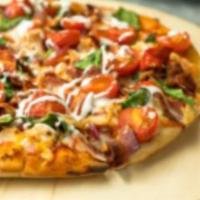 Spicy Chicken Pizza · Buffalo spicy sauce, mozzarella cheese, chicken breast, green peppers, sun-dried tomatoes an...