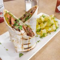 Homestyle Shawarma Roll · Chicken or beef shawarma, sumac onion, pickles, tomatoes, cucumbers and homemade tzatziki or...