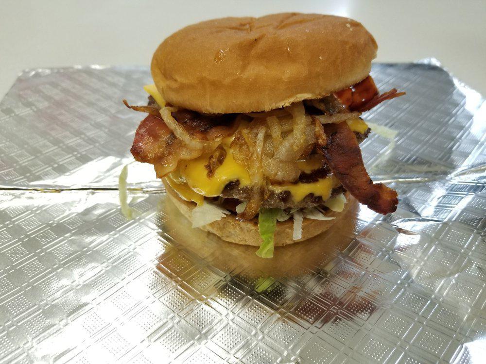 1/3 lb Adrianna Burger · Bacon, Two kinds of Cheese, fried onion,ketchup,mustard,pickles,lettuce,and tomato
