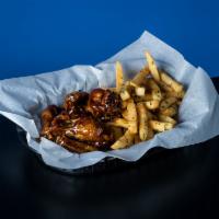 63Forty Wings · 6 Chicken wings fried to perfection tossed in your choice of sauce and served with french fr...