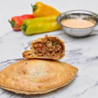 Impossible Beef Empanada · Beefless ground, eggplant, onions, carrots, tomato sauce, green and red peppers.
