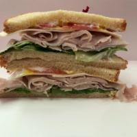 Turkey Provolone Sandwich · With lettuce, tomato, and mayo.