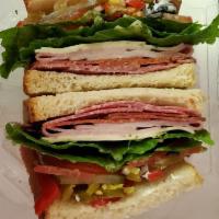 Spicy Italian Sandwich (Pepperoni, Salami, & Ham) · With pepper jack cheese, lettuce, pickles, banana peppers, jalapeños, fire roasted red peppe...