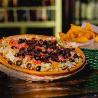 7 Layer Dip · A generous portion of refried beans layered with queso dip, jalapeno cream cheese, lettuce, ...