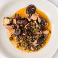 Grilled Octopus · Slow cooked tender octopus, in a flavorful sauce of oregano, olive oil, caper and lemon juic...