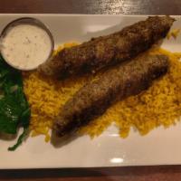 Turkish Kafta Kebab · Skewered charbroiled ground beef, seasoned with turkish spices, over rice pilaf served with ...