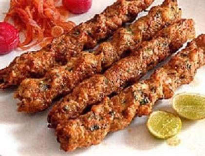 Veggie Shish Kebab · Two grilled seasonal vegetable skewers. Served over rice pilaf and Greek salad. Vegetarian.