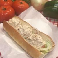 13. White Tuna and Cheese Sub · Heated and served with mayonnaise, lettuce, tomatoes, onions and Italian dressing.