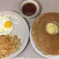 American Breakfast · American 2 farm fresh eggs served with potatoes and your choice of 2 pancakes or toast or bi...
