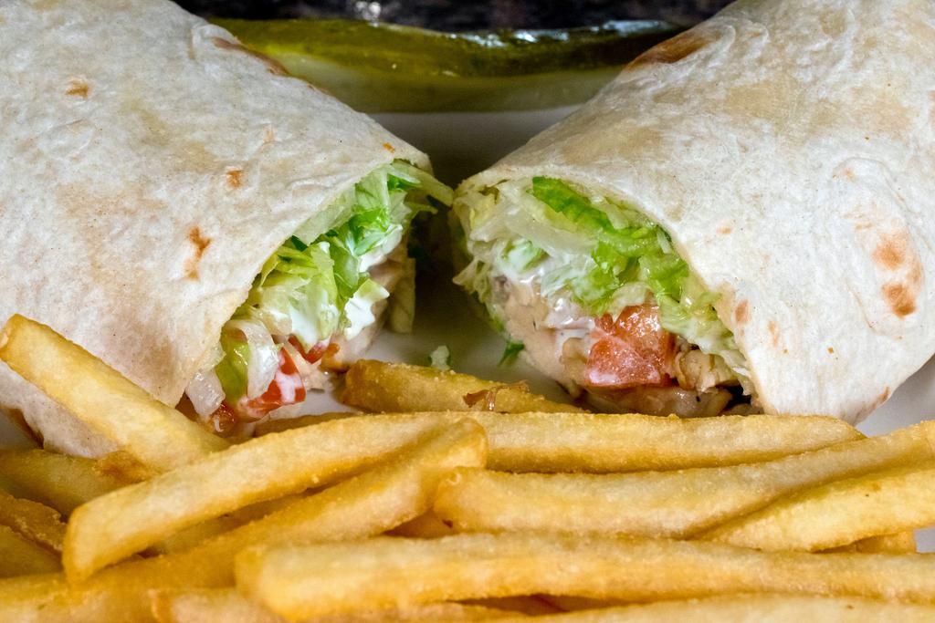 Chicken Wrap · Roasted garlic chicken, lettuce, tomato and your choice of sauce wrapped in a tortilla.