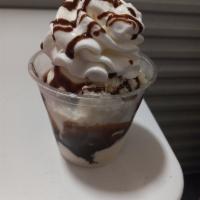 Chocolate Delight Sundae · (SC). Vanilla ice cream, chocolate drizzle, nuts whipped cream, topped with a cherry.