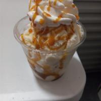 Caramel Delight Sundae  · (SC). Vanilla ice cream, caramel drizzle, nuts whipped cream, topped with a cherry.