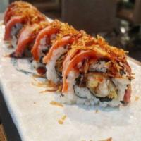Tiger Maki · Tuna, salmon, and asparagus lightly fried with spicy yaki sauce. Item served raw. Substitute...
