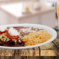 Mexican Enchilada Dinner  · Enchiladas mexicanas. Served with lettuce, cheese and sour cream, rice and beans.  Servido c...