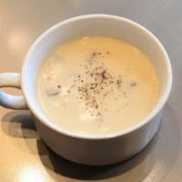 S1. HK Style Corn Chowder Soup · Creamy corn soup with slices of mushrooms and bits of chicken
