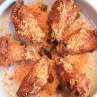 AP1. Hong Kong Style Fried Wings · *Recommended* Chicken wings fried and topped with garlic chili breading
