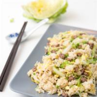 TS3. Scallion Beef Fried Rice in Traditional Asian Soy Au Jus · Beef and scallion stir-fried with rice in a traditional Asian soy au jus
