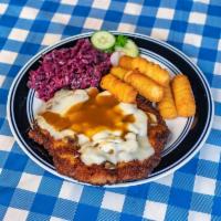 Alpen Schnitzel · Tender pork cutlet hand-breaded and pan fried golden brown and topped with mushroom gravy an...