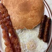 Country Breakfast · 2 farm fresh eggs any style, 2 pancakes, 2 bacon strips and 2 sausage links.