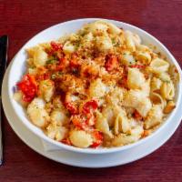 Lobster Mac and Cheese · Smoked gouda mac and cheese loaded with fresh lobster meat. 