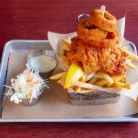 New England Fish and Chips · Fresh haddock, lightly battered and fried until golden. Served with fries, homemade onion ri...