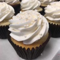 Wedding Cake · Almond cake topped with almond buttercream.