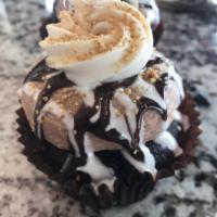 Chocolate Cream Cupcake · Chocolate cake filled with our signature buttercream topped with our signature fudge frostin...