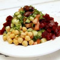 Sahara Salad · A culture favorite, the perfect mix of finely cut cucumbers, tomatoes, beets, chickpeas and ...