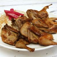 Quails · Tender quails seasoned and charbroiled to perfection. Gluten free.