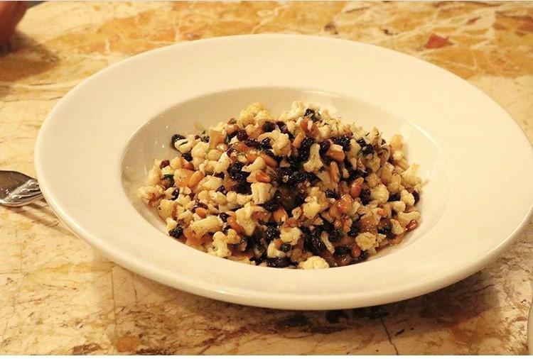 Cavolfiore Salad Dinner · Roasted cauliflower, black currants, caramelized onions, pine nuts and breadcrumbs.