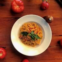 Vegan Spaghetti Pomodoro · Pasta with fresh tomato sauce and basil. Vegan.