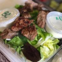 Steak Tips Garden Salad · Green salad with mixed vegetables.
