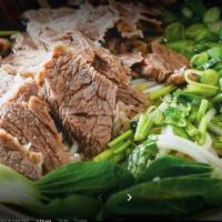 Guizhou Huaxi Style Beef Soup · Choice rice noodle or regular noodle.