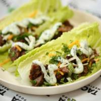 Lettuce Wraps · Choice of chicken, pork, Vida veggies or steak. Topped with Mexican cheese and pico de gallo...