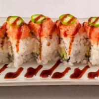 Red Dragon Roll · Shrimp tempura, cucumber, avocado topped spicy tuna, jalapeno, eel sauce.