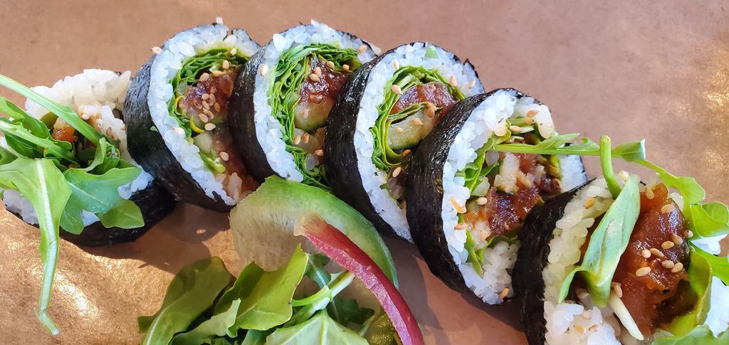 Ebisu spicy tuna roll · spicy tuna, wasabi, arugula, cucumber, sesame seed, rolled with nori on outside