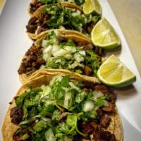 Tacos diners · (Meet: beef, chicken, carnitas) (sides: rice, beans, chips, plantain, yucca)