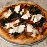 La Casanova Pizza · Grilled chicken, spinach, sun dried tomatoes, ricotta, mozzarella cheese and tomato sauce.