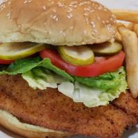 Fried Fish Sandwich · Half a pound of Grouper filet battered ＆ fried Served on a bun with lettuce, tomato, fries a...