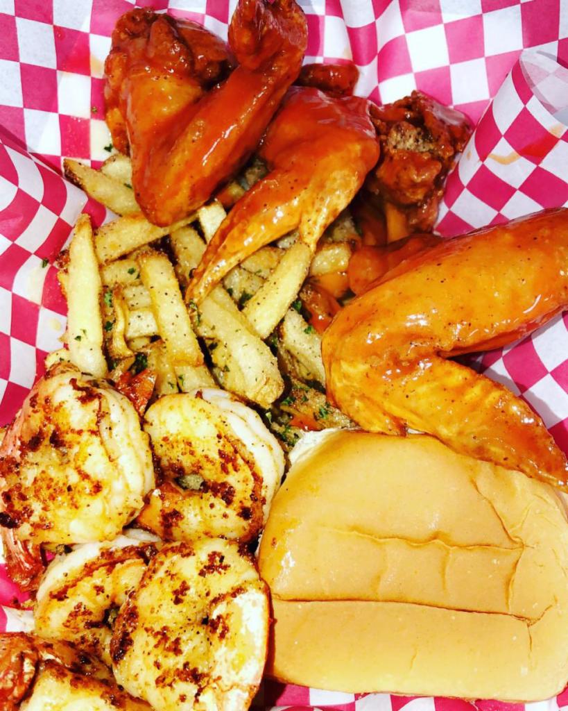 Chicken and Shrimp Combo · 3 whole wings and 1/4 lb. of jumbo shrimp grilled or fried served with a dinner roll, and fresh cut fries.