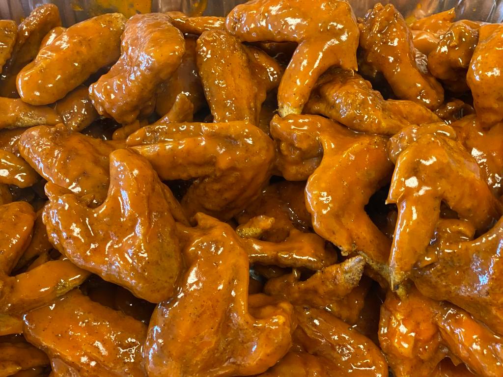 50 Whole Wings · Served with choice of sauce.

