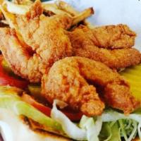 Shrimp Po Boy · Served fried or grilled on fresh French bread, crispy lettuce, pickles, tomatoes, and house ...